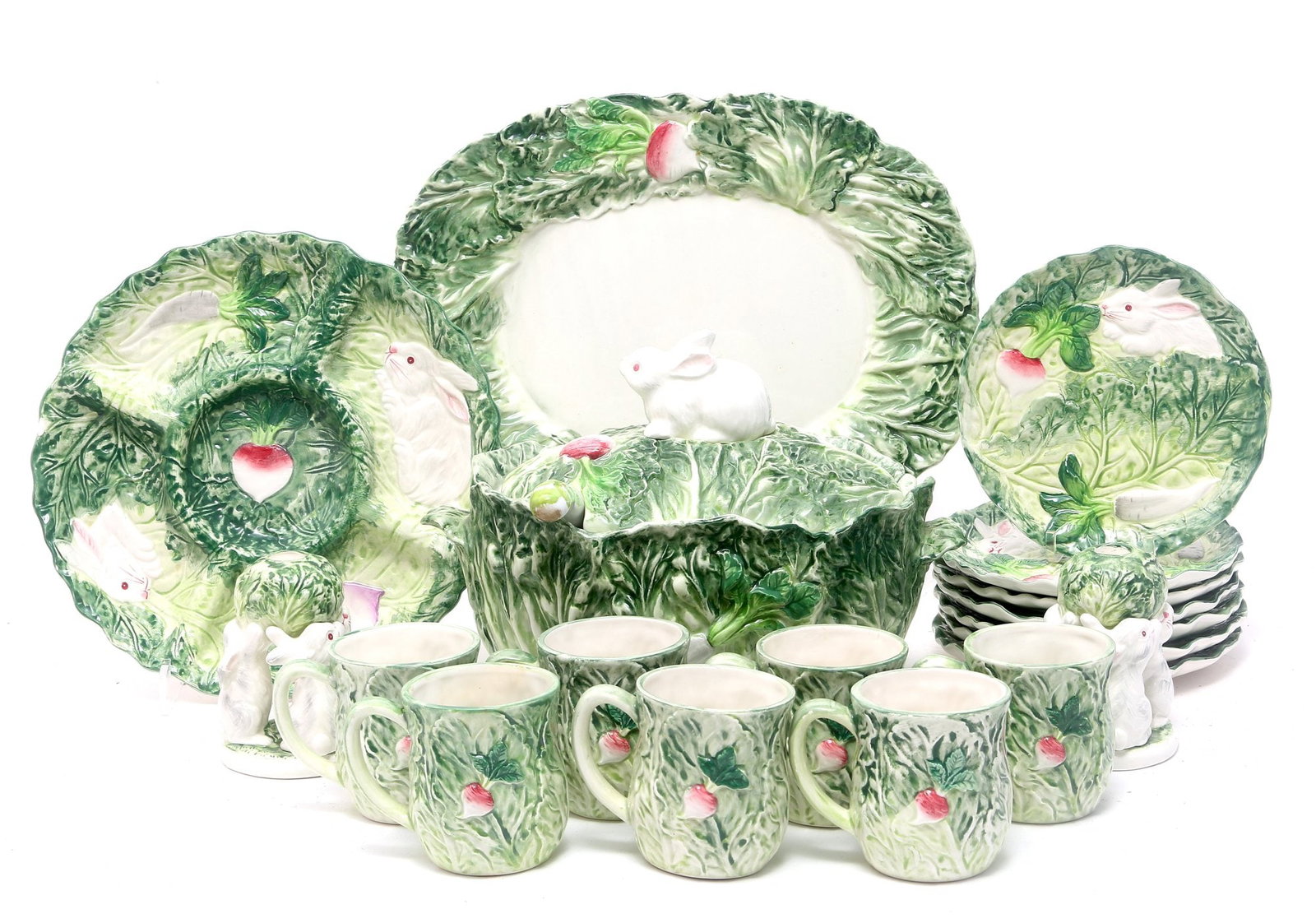 Stafford Rabbit Patch Dish Set: 20 piece Stafford fine bone china dishware set was crafted in Japan during the mid-1900s. This 1987 collection features hand-painted designs that mimic cabbage or lettuce leaves with charming bunny ra