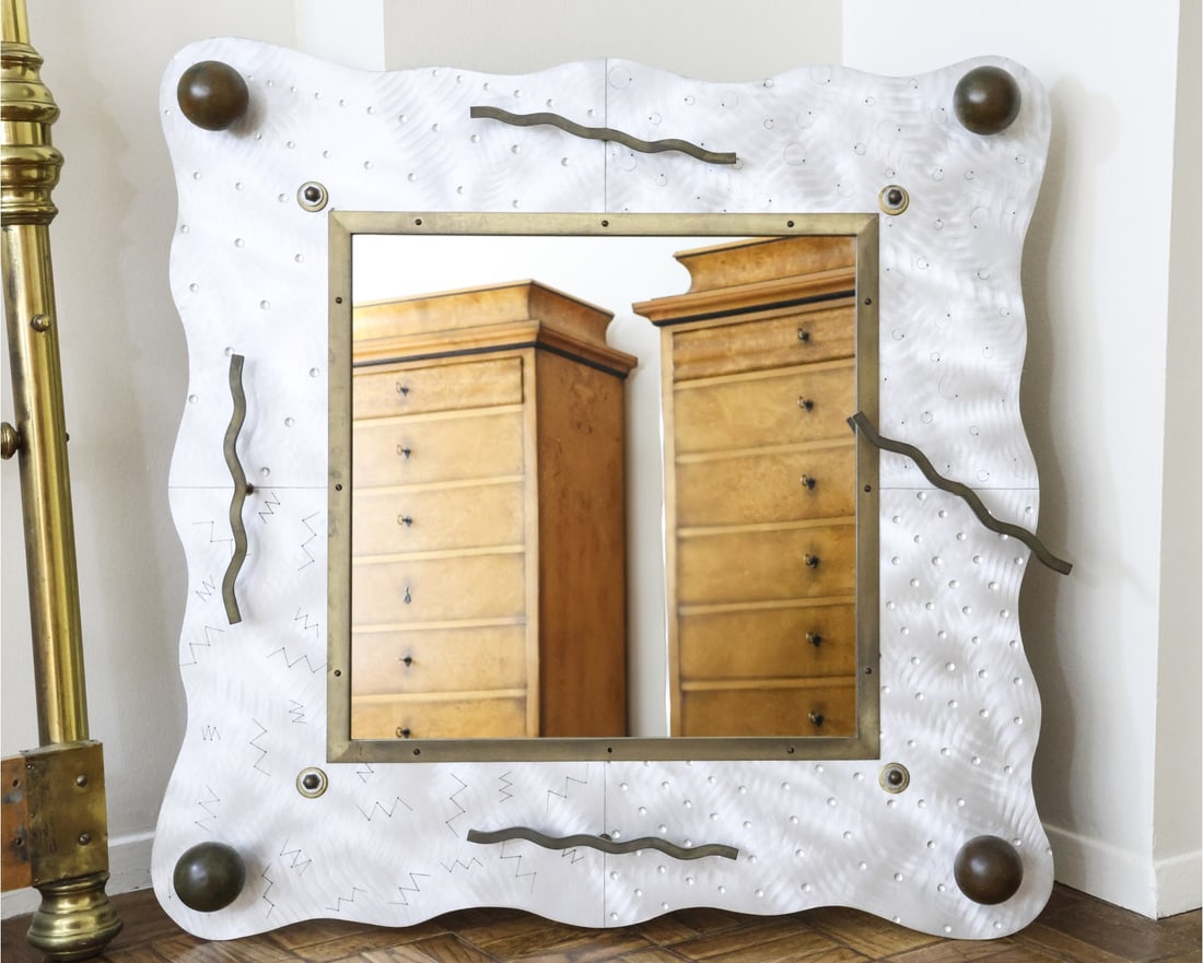 Thomas Mann Techno Romantic Post Modern Mirror: Metal frame measures 39.5 x 39.5 Low Estimate: 500.00 High Estimate: 1000.00