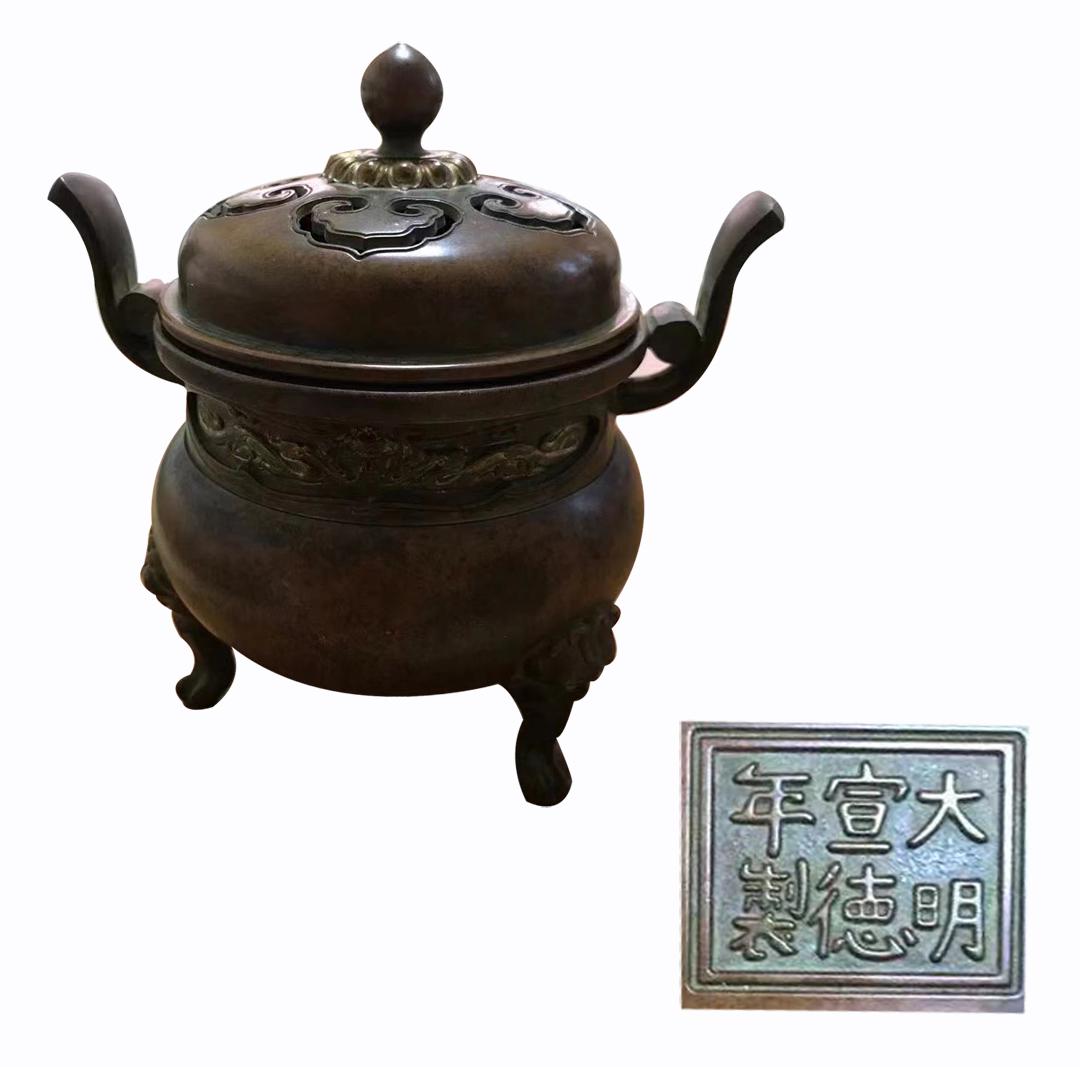 A MING DYNASTY STYLE TRI-LEGGED DOUBLE HANDLE CENSER (1 of 1)
