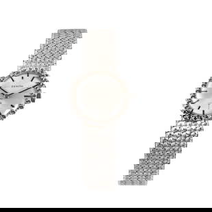 ZENITH: Fine and elegant , 18K white gold lady's wristwatch with diamonds and gold braceletMade circa 1960DIAM: 23 mmApprox. overall lenght: 165 mm