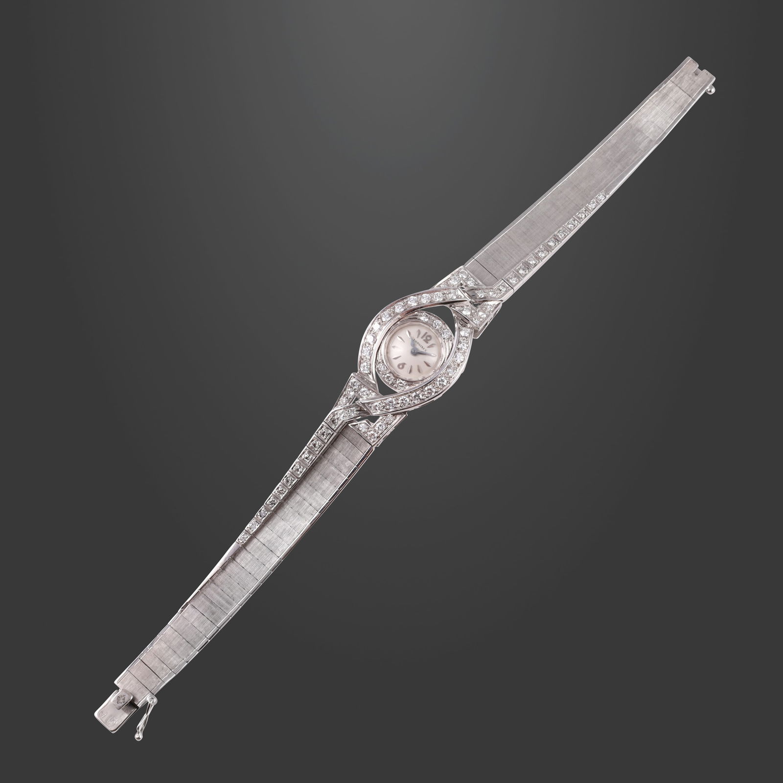 18KT GOLD WRISTWATCH WITH DIAMONDS, LONGINES: Total gross weight gr. 39,1 Length approx. 16 cm