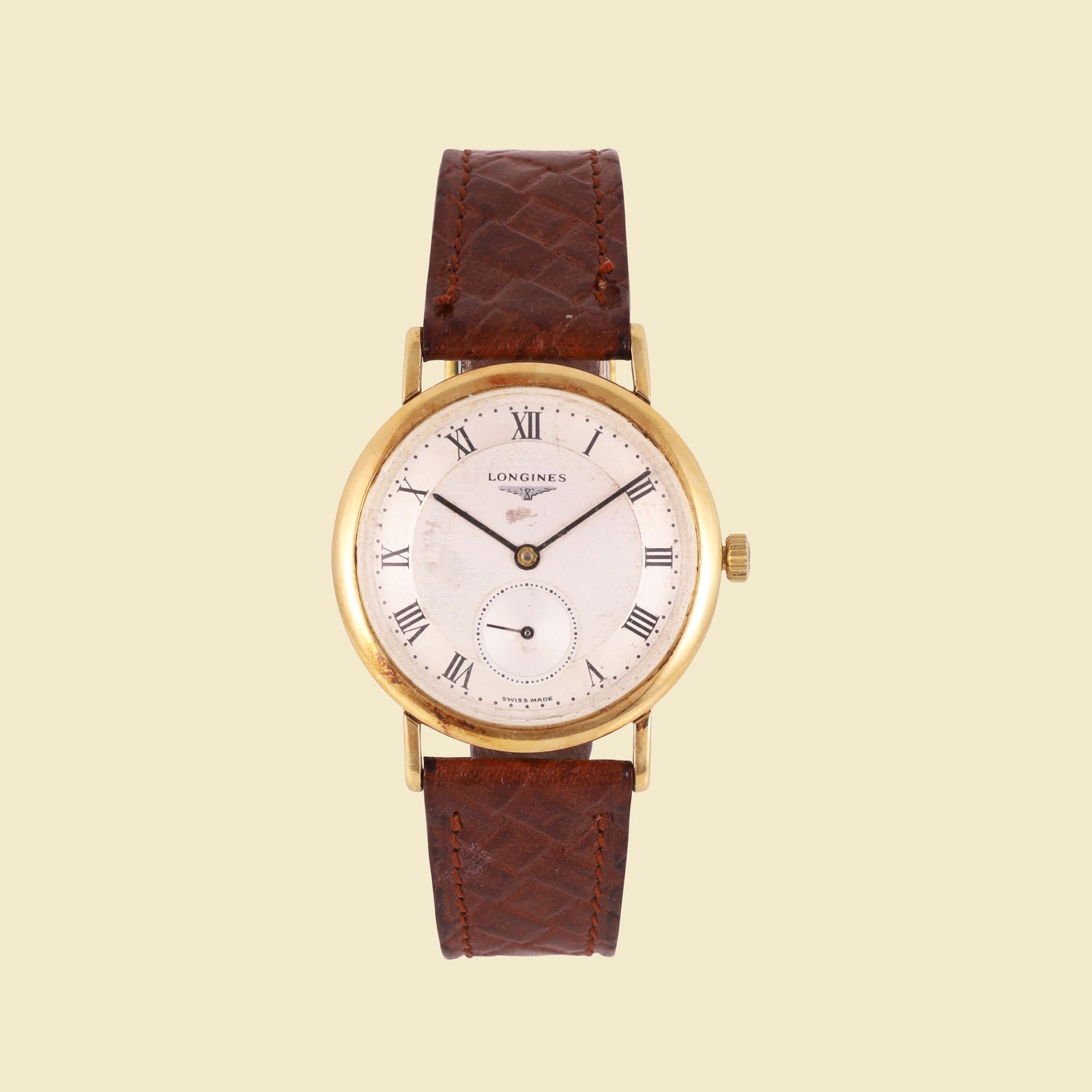 Longines: Ref: 1013-1Fine, 18K yellow gold wristwatchMade circa 1990DIAM: 33 mm