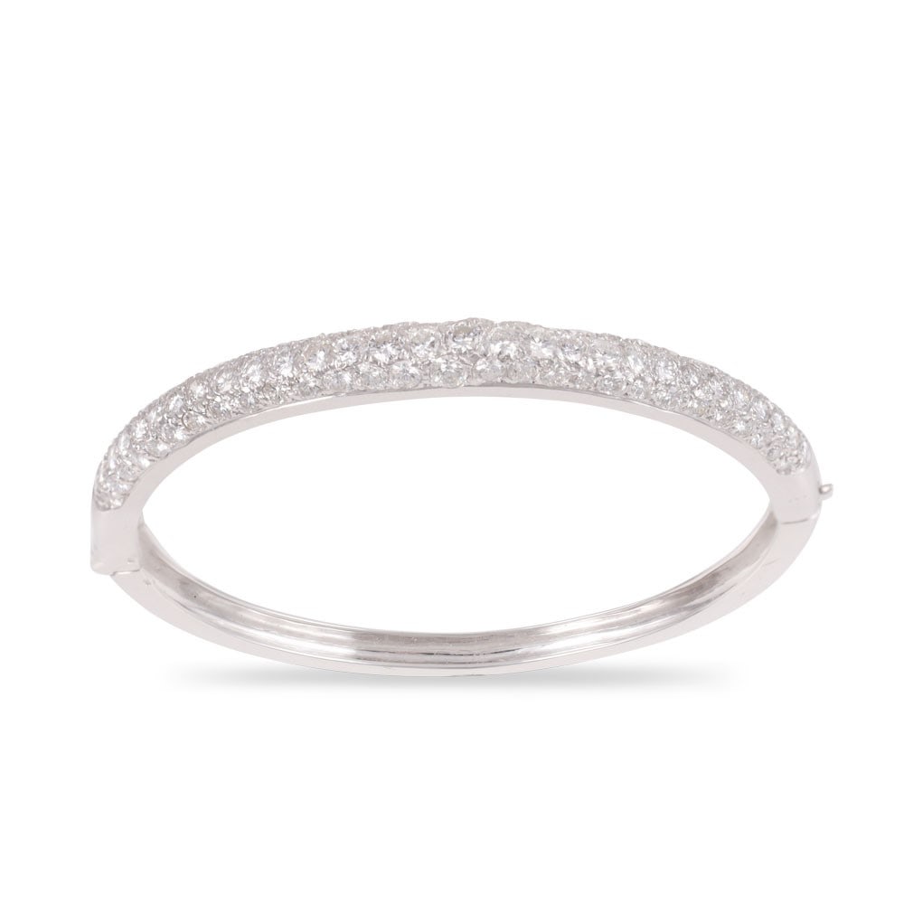 18KT GOLD BANGLE SET WITH DIAMONDS: Total weight gr. 24,4 Total diamonds weight approx. 4 ct Size approx. 17 cm