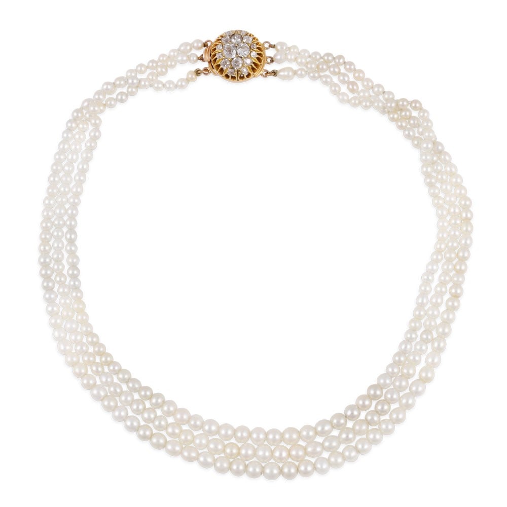THREE-STRAND GRADUATED NATURAL SALTWATER PEARL NECKLACE WITH 18KT GOLD DIAMOND-SET CLASP: Total gross weight gr. 28 Diameter pearls from 5,01 mm to 3,05 Length approx. 35 cm Report no. JR25029 dated 8th July 2025, issued by the RAG laboratory in Turin, certifying that the necklace is compo