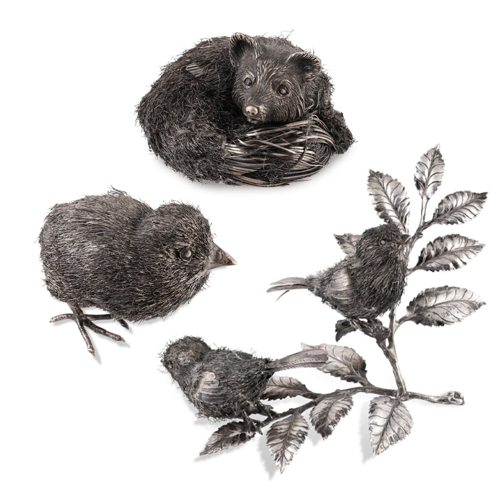 800 SILVER LOT COMPRISING THREE SCULPTURES, ONE SIGNED BY GIANMARIA BUCCELLATI (FOX): Total weight approx. gr. 330 Dimensions approx. 6,5 x 5,5 x 4 cm ca. (fox); 15 x 11 x 12 cm ca. (branch with sparrow); 10 x 6 x 8 cm ca. (chick) Fox signed by Gianmaria Buccellati; the remaining sculp