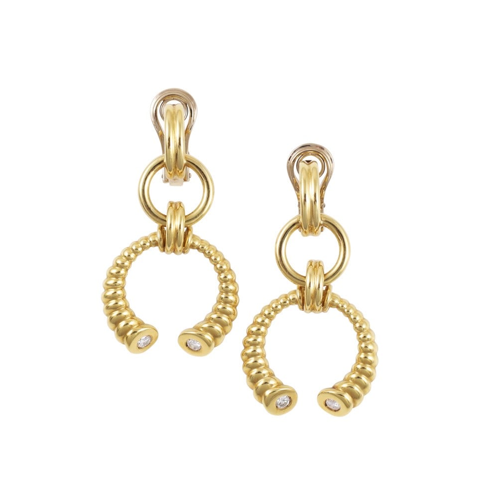 18KT GOLD EARRINGS SET WITH DIAMONDS: Total weight gr. 18,9 Dimensions approx. 4,3 x 2,2 cm