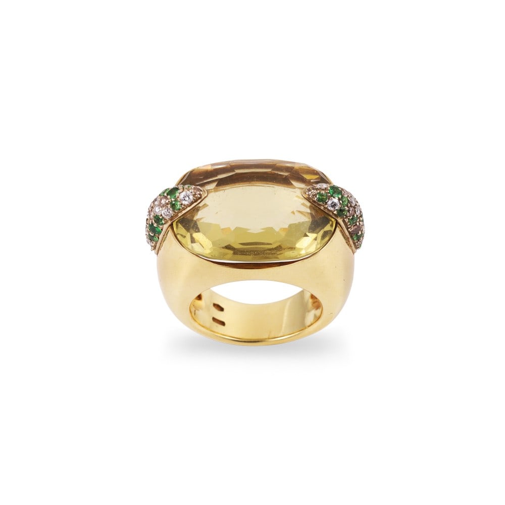 18KT GOLD RING SET WITH QUARTZ, DIAMONDS AND TSAVORITES (two missing): Total weight gr. 36,1 Size 17 (IT) Signed Pomellato