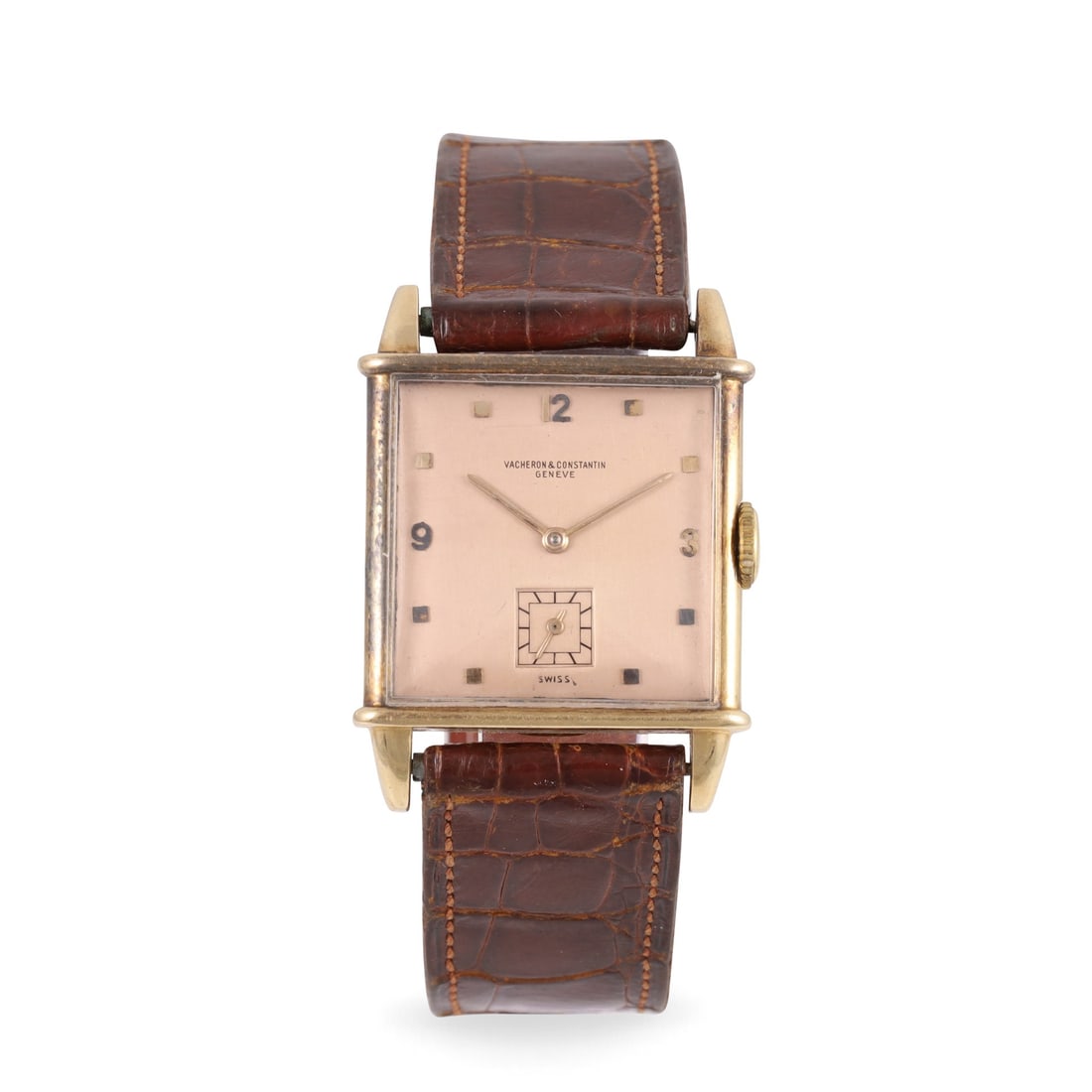 VACHERON CONSTANTIN: VACHERON CONSTANTIN Fine, square shaped, 18K yellow gold wristwatch with salmon dial and gold original buckle Made circa 1940 DIM: 26 x 37 mm Note: overhaul recommended, not working