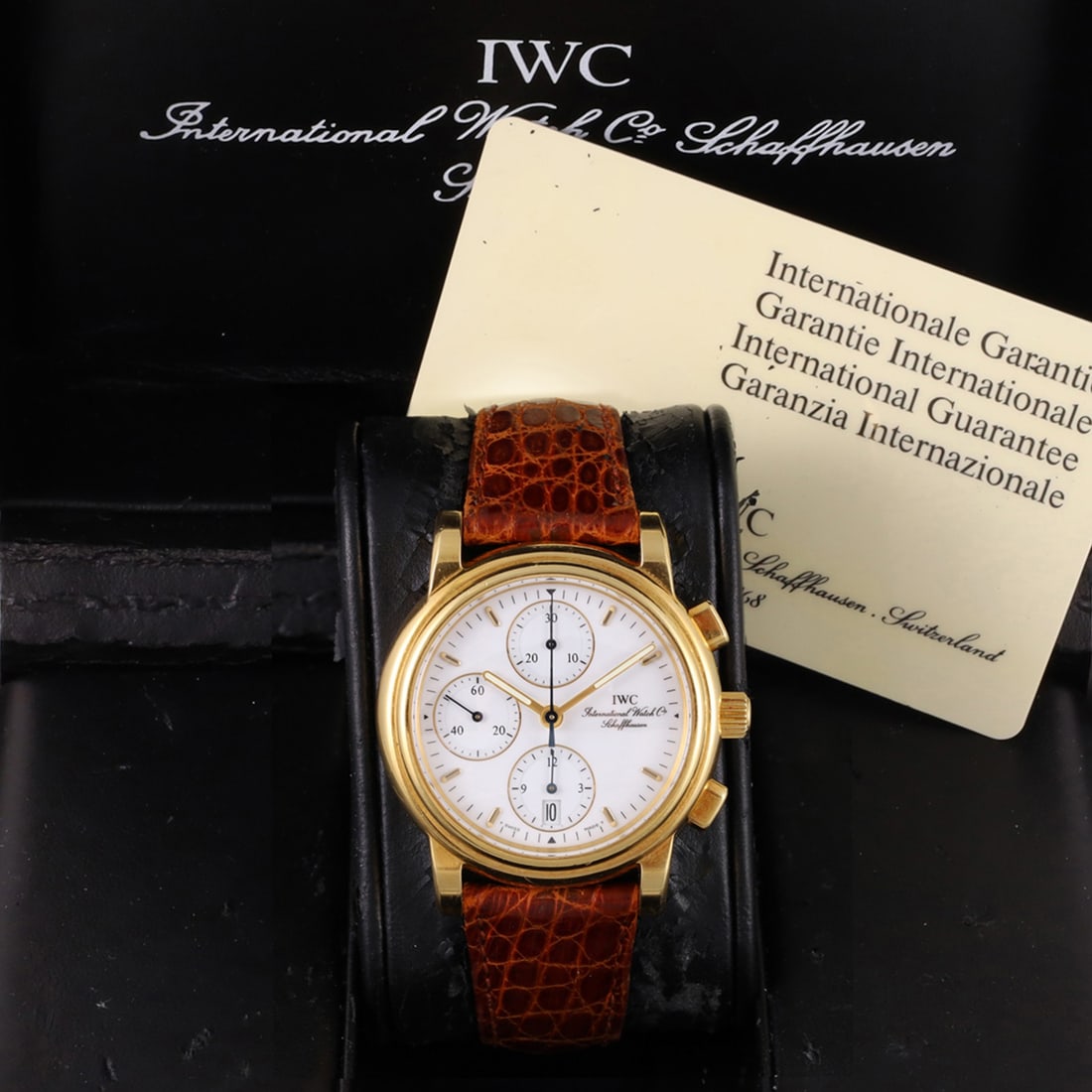 IWC: IWC Ref: 3703, 'Amalfi', 'Limited Edition' A rare and elegant , self-winding, 18K yellow gold chronograph wristwatch with date and original gold buckle Sold in 2003. Accompanied by the original box