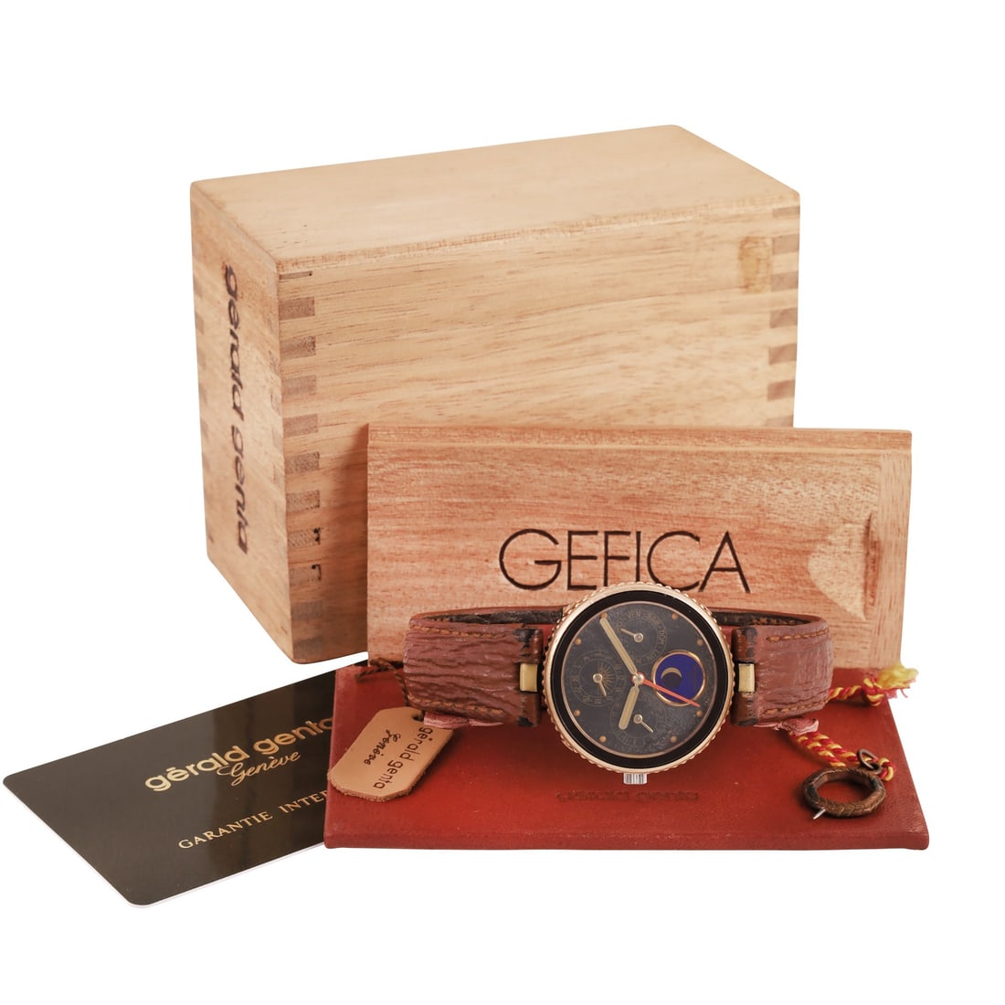 Gerald Genta: Gerald Genta Ref: G 2796.4, 'Gefica Alarm' Fine and unusual, steel and bronze quartz wristwatch with moon phase, perpetual calendar and deployant clasp with attached compass Made circa 1990.