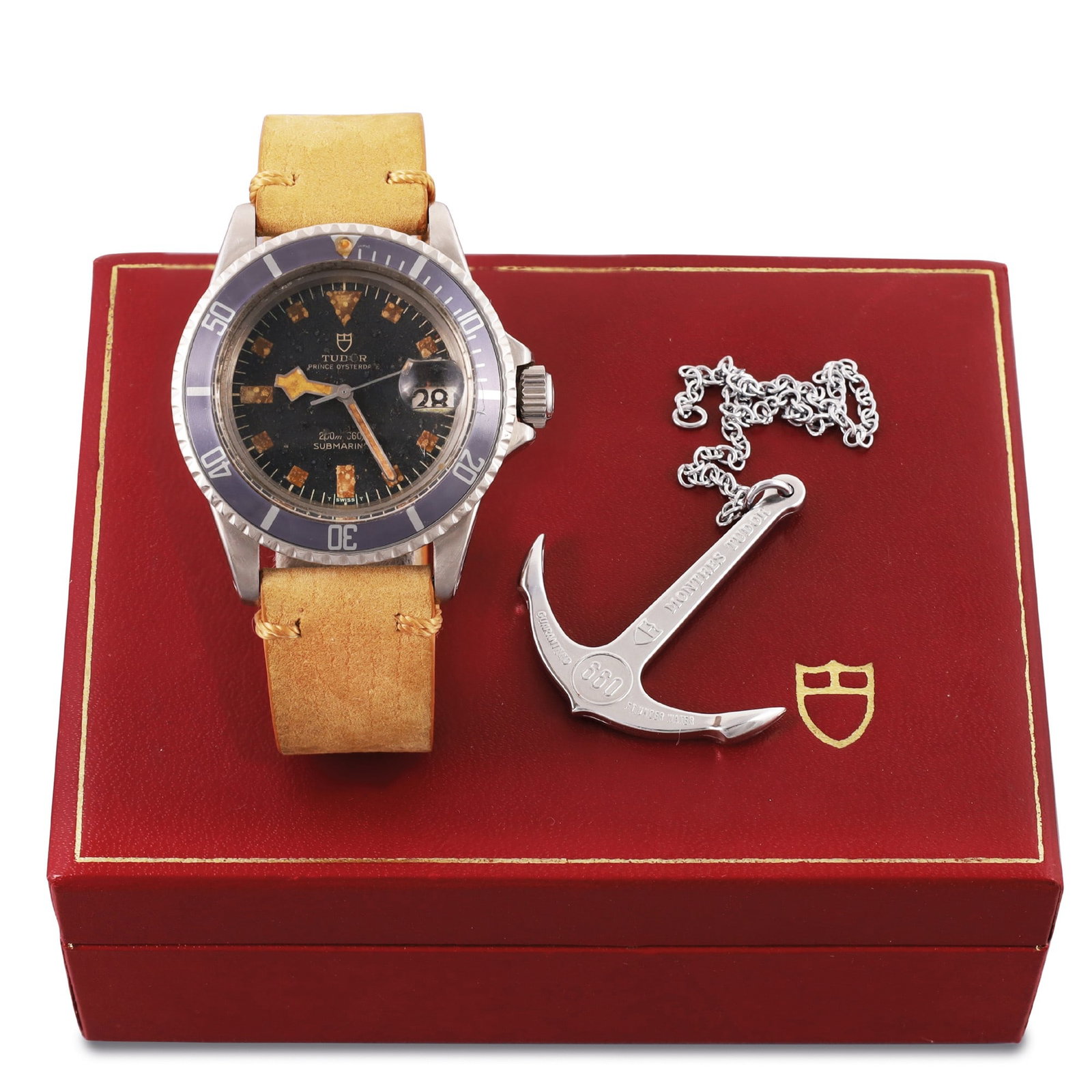 TUDOR: TUDOR Ref: 9411, 'Submariner Snowflake' Fine and attractive, self-winding, stainless steel wristwatch with date Accompanied by the original box and anchor Made circa 1983, case signed Rolex No.