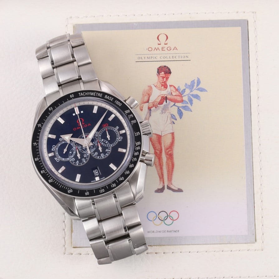Omega: Omega Ref: 3213044, 'Speedmaster Broad Arrow Oympic' Fine and large, self-winding chronograph wristwatch with luminous steel baton hour markers and broad arrow hands. Thirty-minute and 12-hour