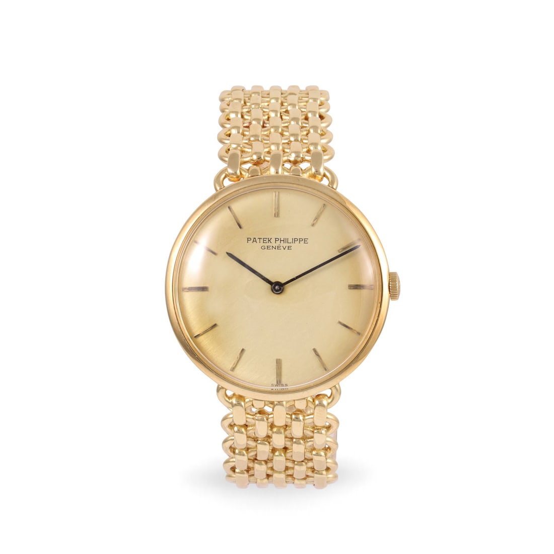 PATEK PHILIPPE: PATEK PHILIPPE Ref: 3562 Fine and elegant, 18K yellow gold wristwatch with textured champagne dial with applied gold baton hour markers, black pointed baton hands, polished round case with snap on