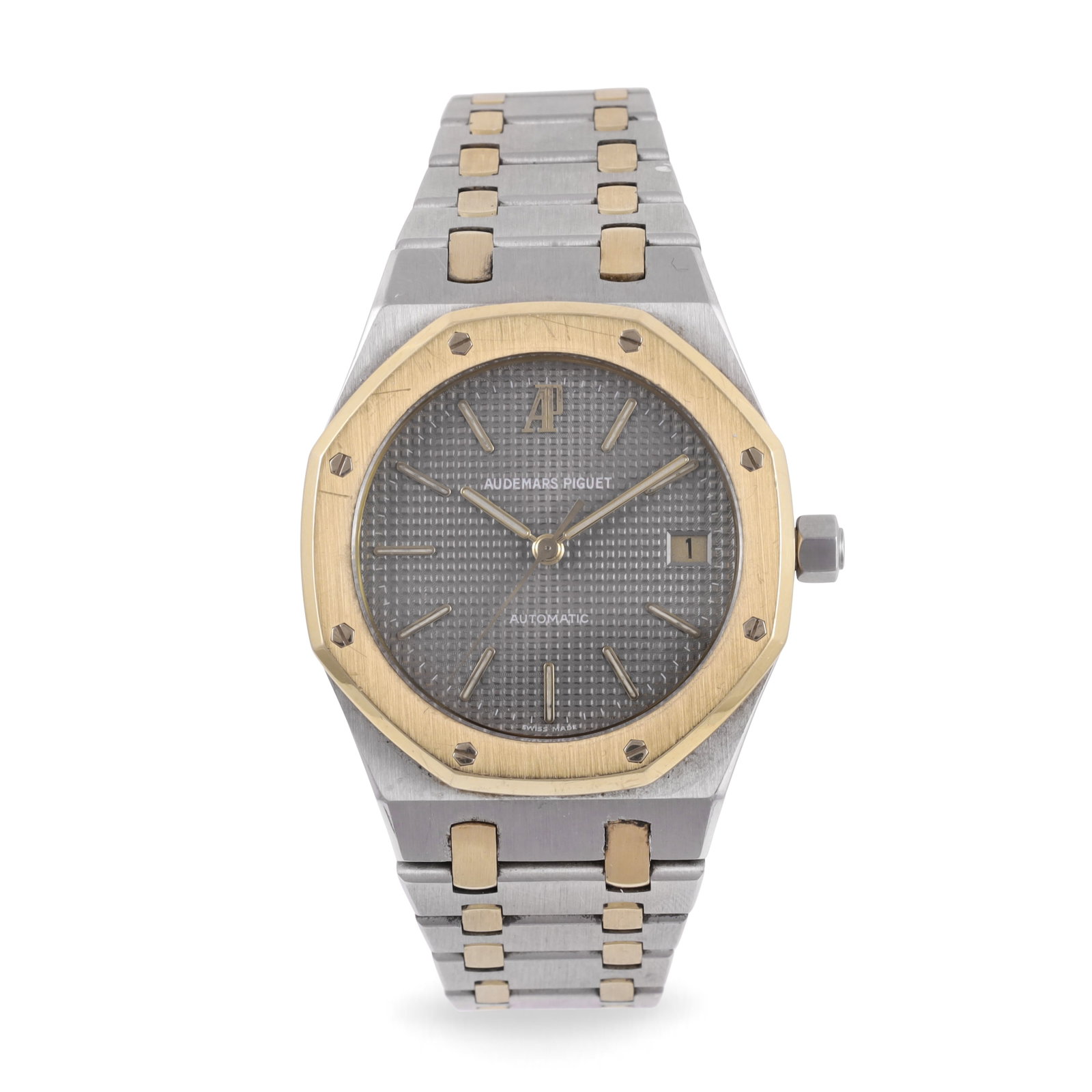 Audemars Piguet: Audemars Piguet Ref: 14700, 'Royal Oak', No. 676 Fine, self-winding, steel and gold wristwatch with date and original bracelet with deployant clasp Sold in 1992. Accompanied by a service original box