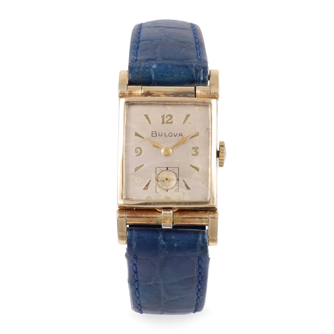 Bulova: Bulova Ref: 'Flip-Top' Fine and unusual, gold plated wristwatch with flip-up case construction Made circa 1950 DIM: 22 x 39 mm