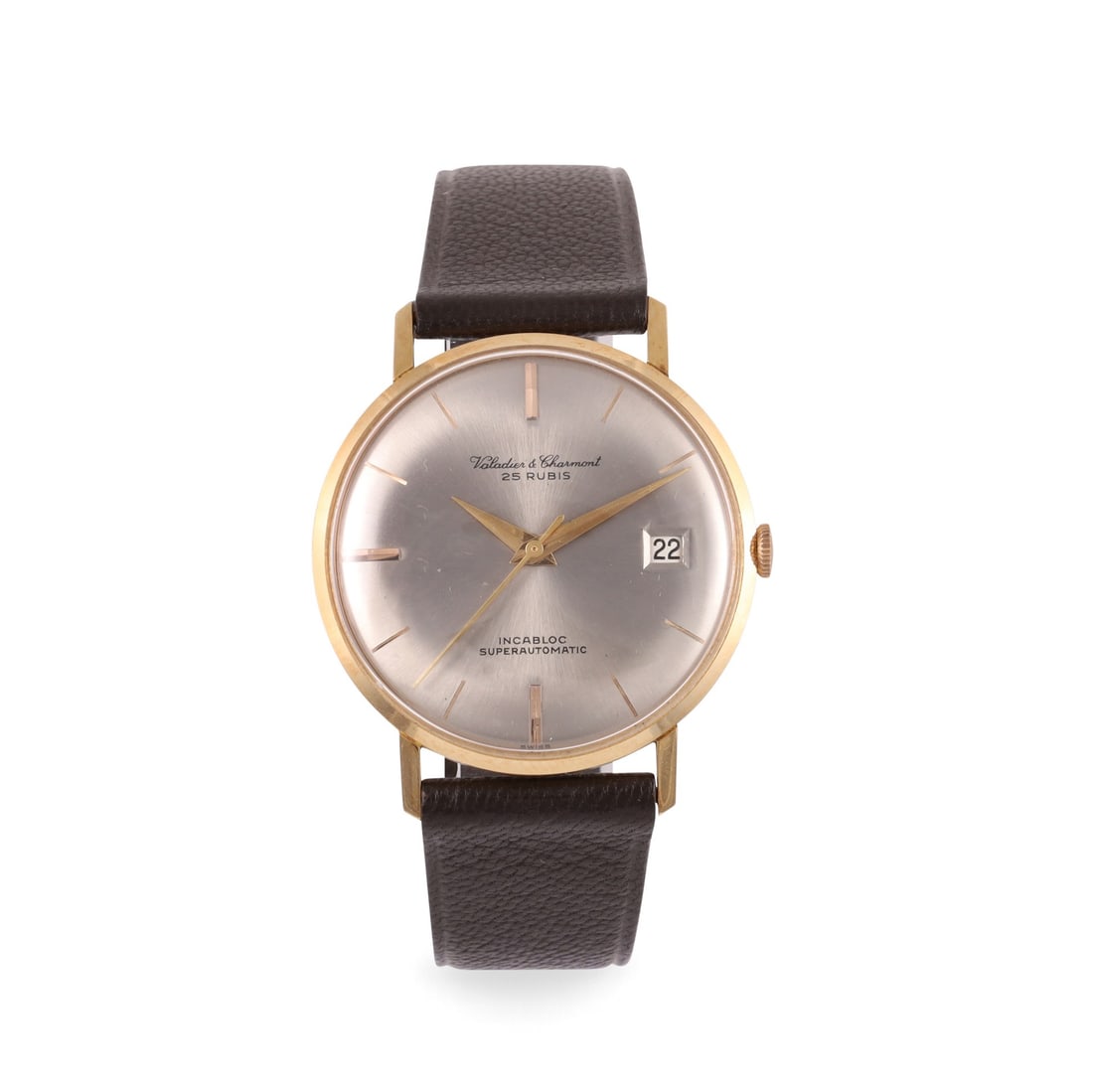 VALADIER & CHARMONT: VALADIER & CHARMONT Fine, 18K yellow gold wristwatch with date Made circa 1960 DIAM: 34 mm Note: New Old Stock