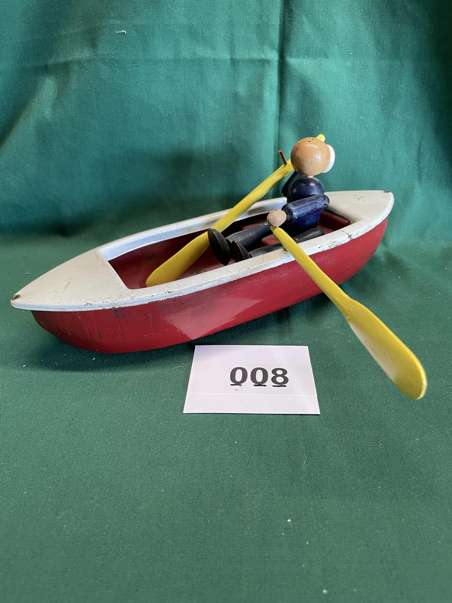 1930's Steel Pull Toy w/wood figure and oars: Shipping is available.