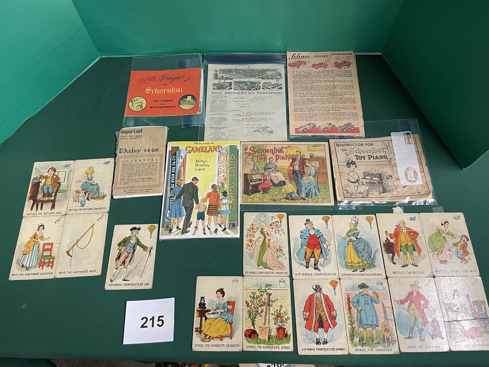 Selection of Misc. paper items. Schuco: Schuco mini racer, Bing Brother Toy company paper, Schoenhut Piano songbooks 3 circa 1900's, Daisy gun guarantee sheet, Set of Sir Hinkley Funny Dust Card set. Shipping is available.