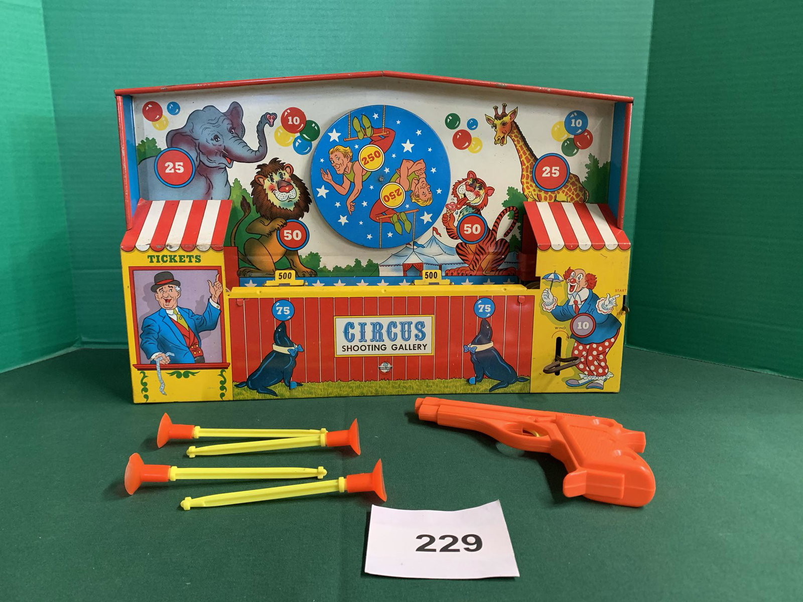 1950's Ohio Art shooting gallery: Old story stock. Wind-up works. Has all the parts. Shipping is available.