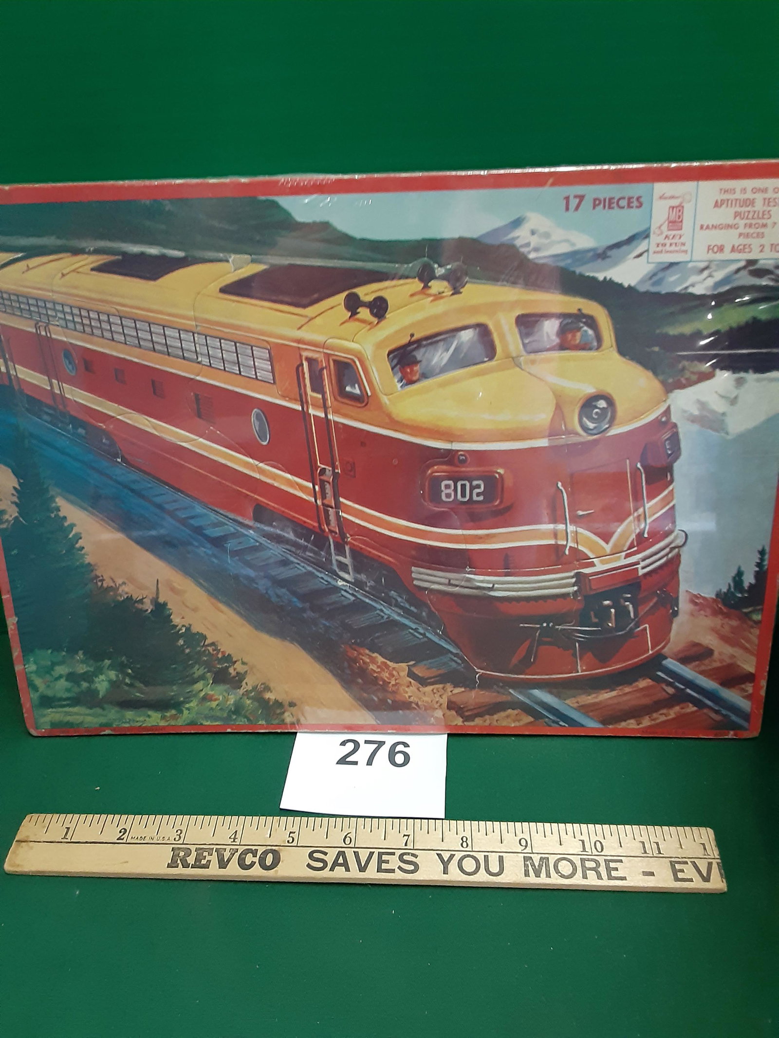 Milton Bradley 17 piece train puzzle: 1958 . Has been lightly played with . Shipping is available.
