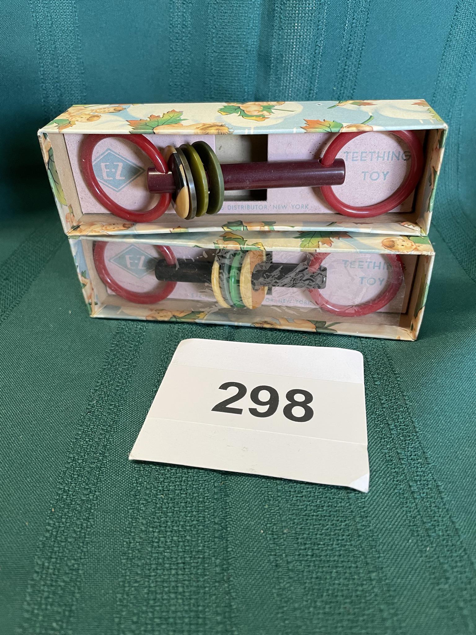 Pair of 1930's E-Z Teething toys Bakelite: Original toys. Unplayed with. Still in boxes. Shipping is available.