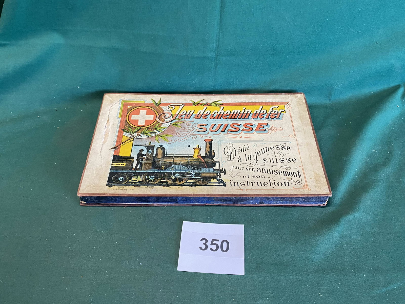 Swiss Board Jeu de Schemin de fer suisse: Late 1800's Toy of horse of fire board game. Has original Tunner Tottare 8 panel game board 28" x 19 1/2". Believe to be complete. Shipping is available.