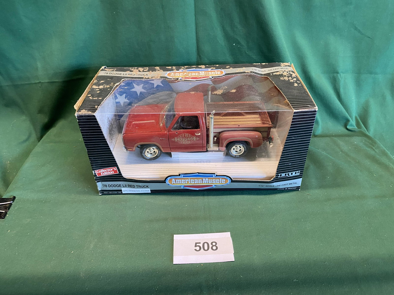 Erti '78 Dodge Lil Red Truck: American Muscle 1/18" scale. Still in box. Box has mud stains. Shipping is available.