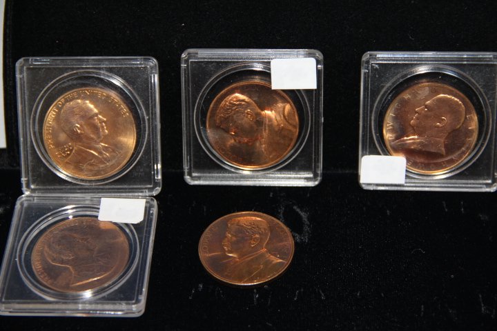 5 Presidential Commemorative Coins: Two Richard Nixon in Cases. Two Theodore Roosevelt, One in Case One Not in Case. One Dwight D. Eisenhower in Case.