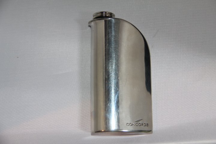 British Airways Concorde Ergo Flask Sterling Silver by: British Airways Concorde Ergo Flask by Sheffield England and artist Chris Middleton. Sterling Silver