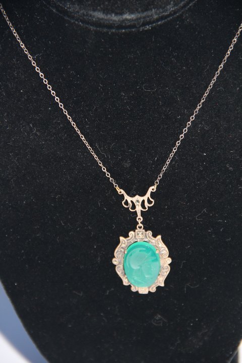 Marcasite and Carved Possibly Agate Necklace: Marcasite and Carved Possibly Agate Necklace. Measures 16 inches long