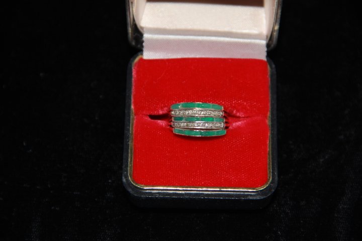 Diamond and Emerald Stackable Ring 14K White Gold: 14K White gold diamond and emerald stackable ring.