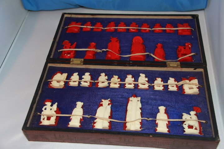 32 Piece Ivory Chess Set. As Is: 32 Piece Ivory Chess Set. As Is. Red and Ivory Colored Pieces. Set is old.