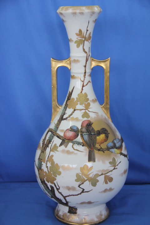 Royal Bonn Porcelain Vase: Royal Bonn Hand Painted and Enameled Porcelain Vase. Measures 16 inches tall. Floral and Dragon Fly decoration.