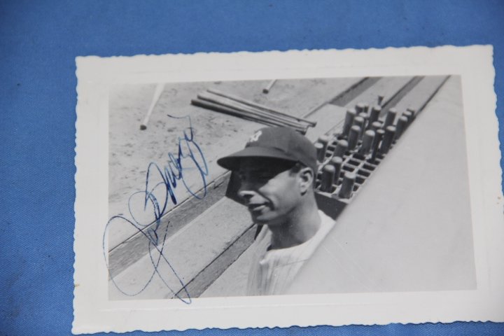 Joe DiMaggio Photos and Autographs and a 1947 World Ser: Joe DiMaggio Photo. One is autographed and one is not. A 1947 World Series Ticket Stub. Consignor was a frequent attendee of the games.