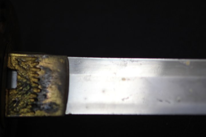 Samurai Sword with Sheath: Samurai Sword w/sheath. Hand guard is loose. Sheath has some chips. Early Edo Period (350 years old)? Shinogi Zukuri Blade.