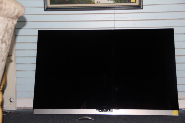 Bang and Olufsen BEOVision TV: Bang and Olufsen BEOVision 7-55, 55 x 36 inch flat screen TV with remote. 3 years old. Current re-sale value provided by Atlanta Bang & Olufsen is $7,500.00