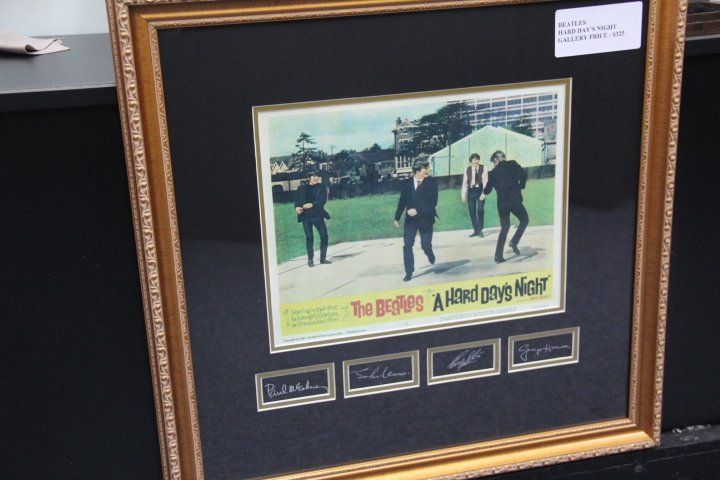 Beatles "A Hard Days Night" Print: Beatles "A Hard Days Night Print". Measures 24 x 24 in. Gold gilt frame.