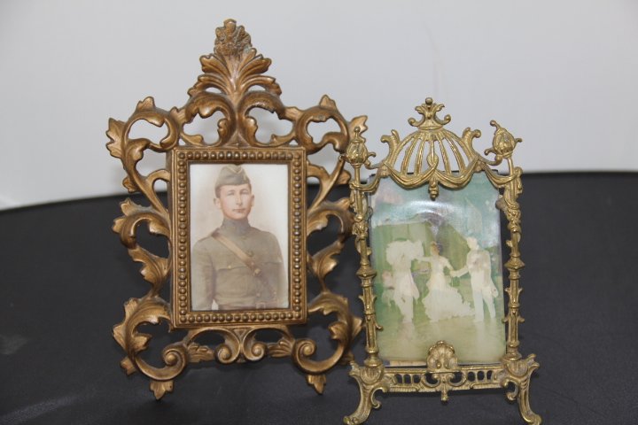 Two Gilt Metal Picture Frames: 21-292 & 295 1 - Louis XV style frame, 7 1/2 in x 6 in wide. 1 - Oriental style frame, 6 1/2 in x 3 1/2 in wide.