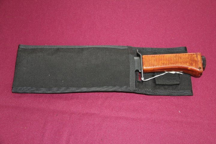 Soviet Multi-functional Military Weapon: 255-931 Soviet multi-functional military weapon. Sovietski Collection #9880. Black steel blade, plastic grip. Nylon scabbard.