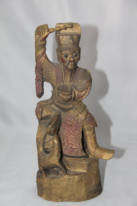 Wooden Buddhist Shrine Statue: 89-3327 Wooden Buddhist Shrine Statue. Carvings like this were found in Buddhist Temples and Shrines throughout China. Original paint remains on this piece. Original condition. Measures 10 1/4 in. tal