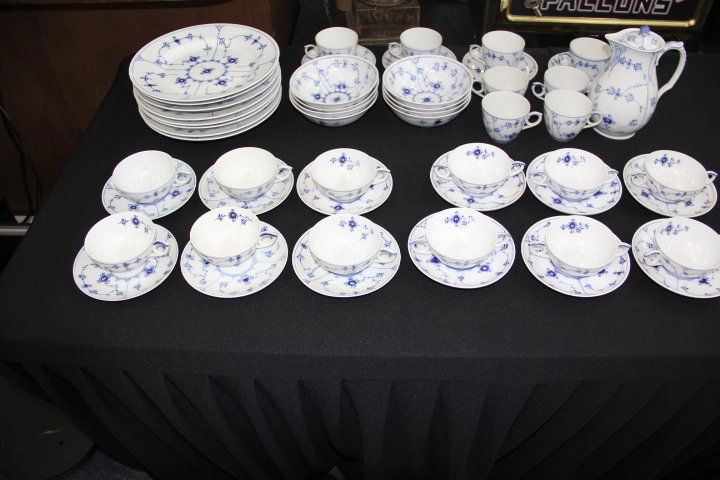 Royal Copenhagen Blue Fluted Plain Dinnerware Set 53: 66-6899 Royal Copenhagen blue fluted plain dinnerware 53 pcs. 7 dinner plates, (one is chipped), 10 in. diam. 8 dinner bowls, 6 in. diameter. 6 bouillon cups and saucers. 6 coffee cups and saucers. 4