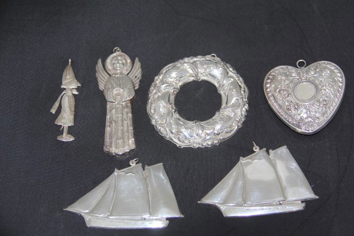 Gorham Sterling Silver Christmas Ornaments: 93-8178 Gorham sterling silver Christmas ornaments. 1983 angel, 1985 nutcracker, 1989 wreath, Victorian heart - no year, 2 - 1984 schooners. 140 grams.