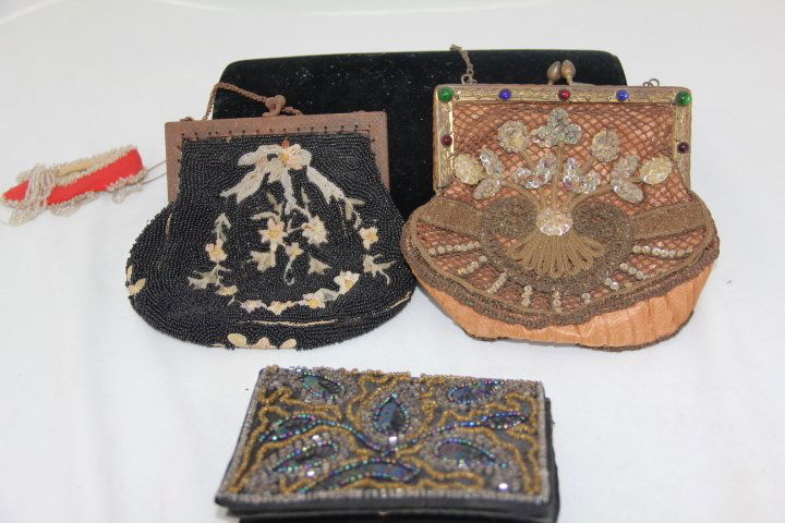 Two Vintage Beaded Purses & One Wallet: 130-8318 Two vintage beaded purses. One marked Germany with multi colored cabochons decorating the frame. Other is marked France and has a beaded floral design. Wallet has beads and sequins. All three