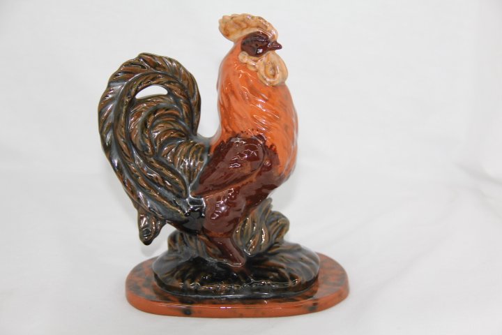 Nolde Forest Pottery Rooster: 179-1863 Nolde Forest redware pottery rooster. Signed, Village of Angelica. Measures 6 x 4 in.