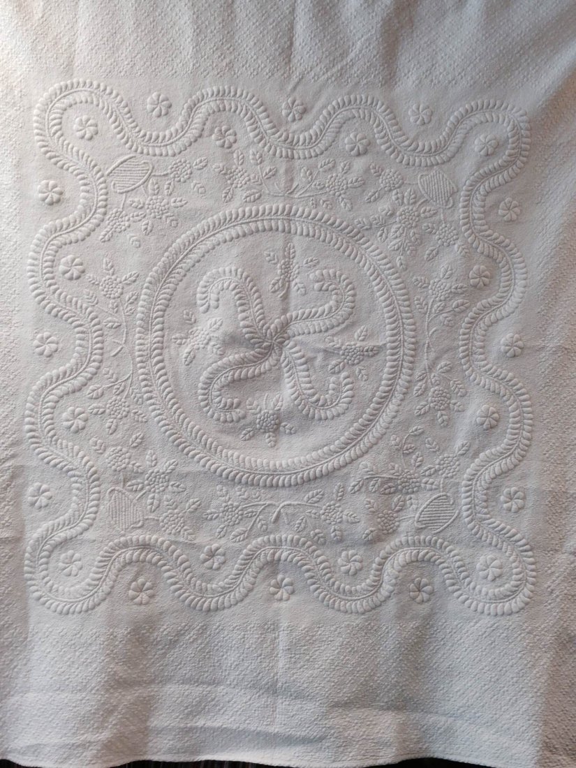 Bridal Trapunto Quilt - Museum Quality: 96-6181 This is the Undated and Unsigned Quilt. # 97 has the dating and signature. Museum quality bridal trapunto style Quilt has a Princess Feather Motif. 74 in. long x 70 1/2 in. wide. Both quilts (