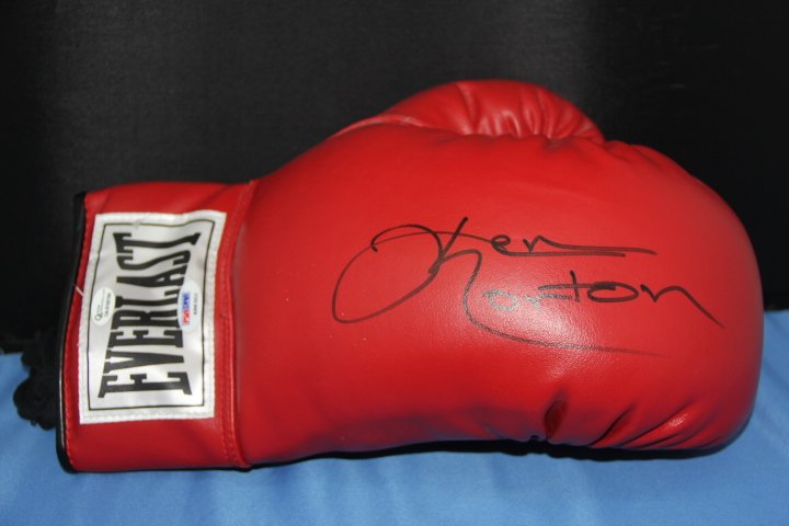 Ken Norton Signed Boxing Glove: 127-2117 Ken Norton signed boxing glove.