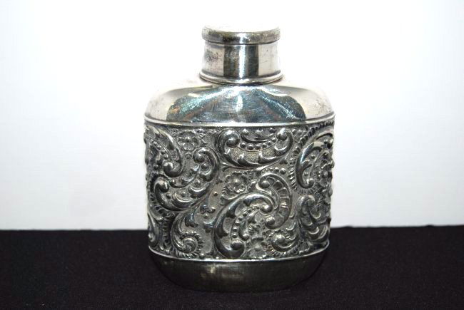 Ornate embossed Silver flask with collapseable cup (1 of 2)
