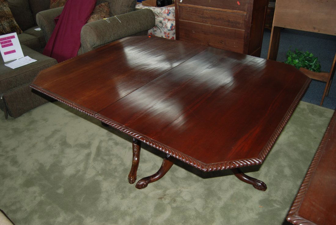 Rectangle Mahogany Dining Room Table: 232-512 Rectangle Mahogany Wooden Dining room table w/ scrolled Trim. Measuring 29" tall; surface measures 52" x 68"; Lot #229 & 232 are matching and will combine to make large setting.