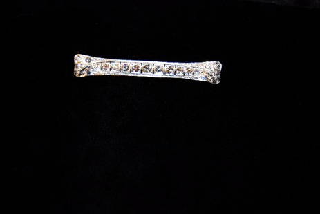 2 ct. Platinum & Diamond Brooch: 346-661 Two Carat Platinum and Diamond Brooch. Art Deco Setting. 2.5" long. World Class item. Would make a stunning Pendant. Good stones, incredible Mine Cut Diamonds.