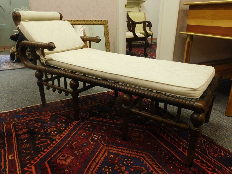 Hunzinger Style Chaise Lounger: Hunzinger style chaise lounger. Measures 62 inches long, 37 inches tall and 23 inches wide. Back support is loose. Upholstery is stained in areas.